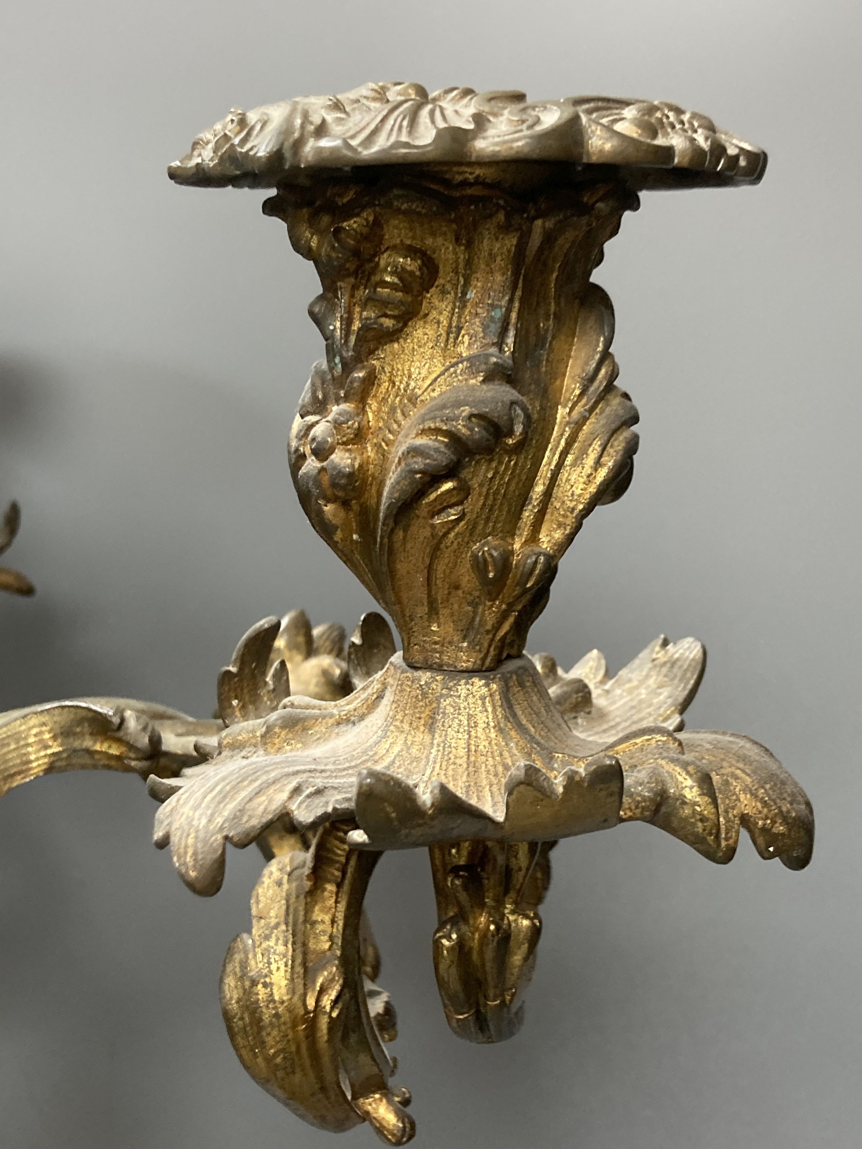 A pair of 19th century Louis XV style ormolu candelabra, 57 cm high